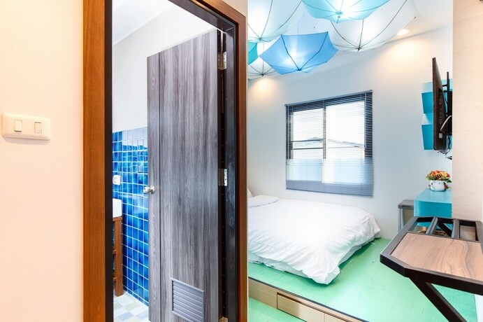 Imagen de la habitación del Hotel Lilliput Riverside Bangkachao. Foto 25