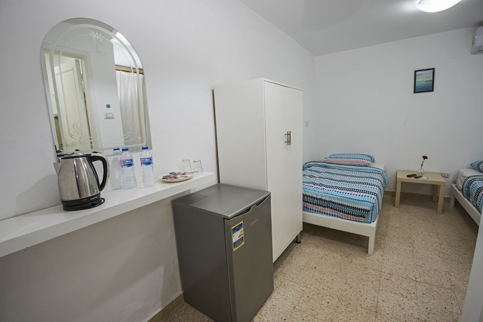 Imagen de la habitación del Hotel Lilly Rooms and Studios. Foto 3