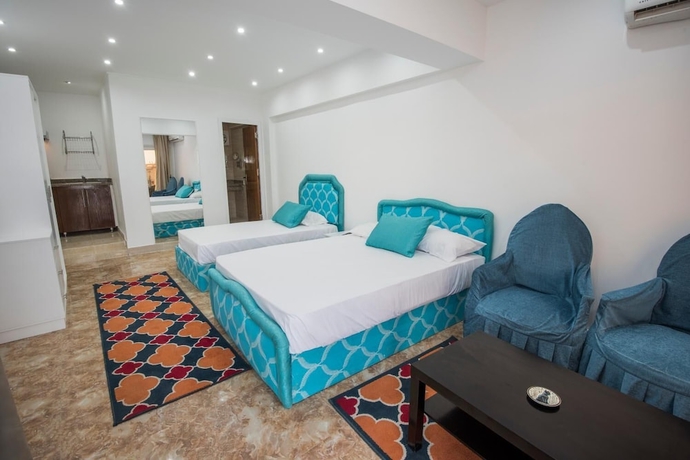 Imagen de la habitación del Hotel Lilly Rooms and Studios. Foto 4
