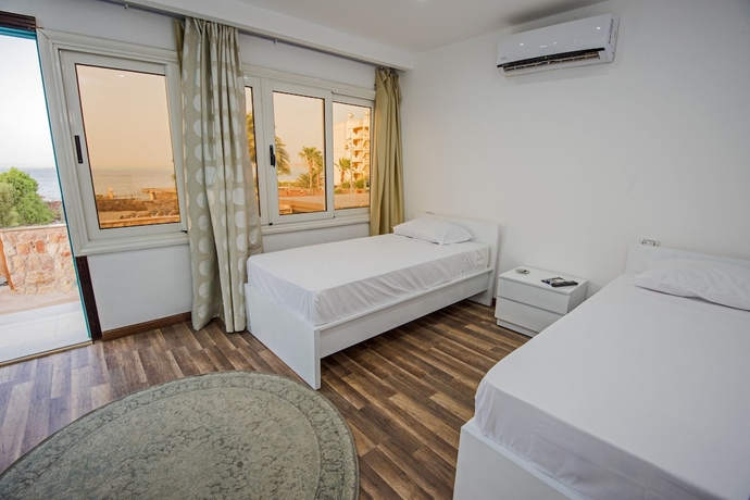 Imagen de la habitación del Hotel Lilly Rooms and Studios. Foto 5