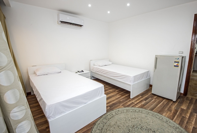 Imagen de la habitación del Hotel Lilly Rooms and Studios. Foto 6