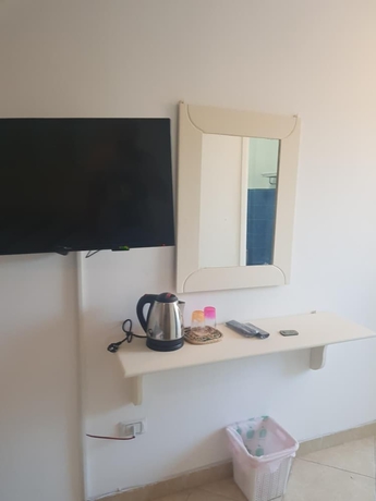 Imagen de la habitación del Hotel Lilly Rooms and Studios. Foto 9