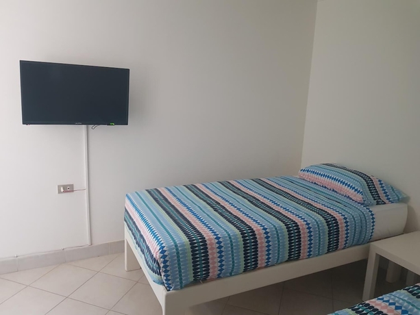 Imagen de la habitación del Hotel Lilly Rooms and Studios. Foto 13