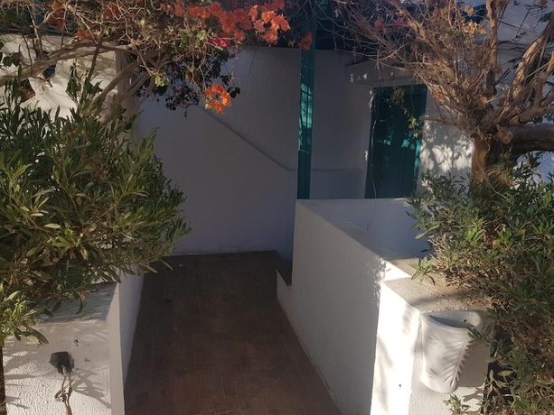 Imagen de la habitación del Hotel Lilly Rooms and Studios. Foto 15