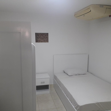 Imagen de la habitación del Hotel Lilly Rooms and Studios. Foto 17