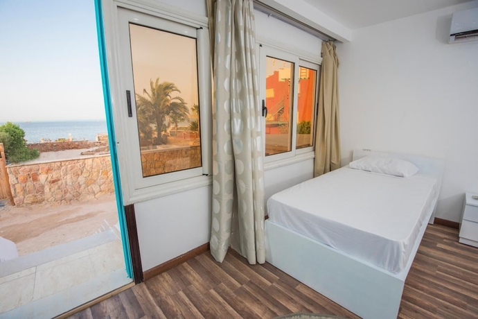 Imagen de la habitación del Hotel Lilly Rooms and Studios. Foto 19