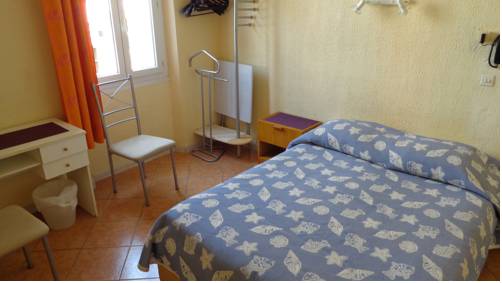 Imagen de la habitación del Hotel L'ilot Fleuri. Foto 9