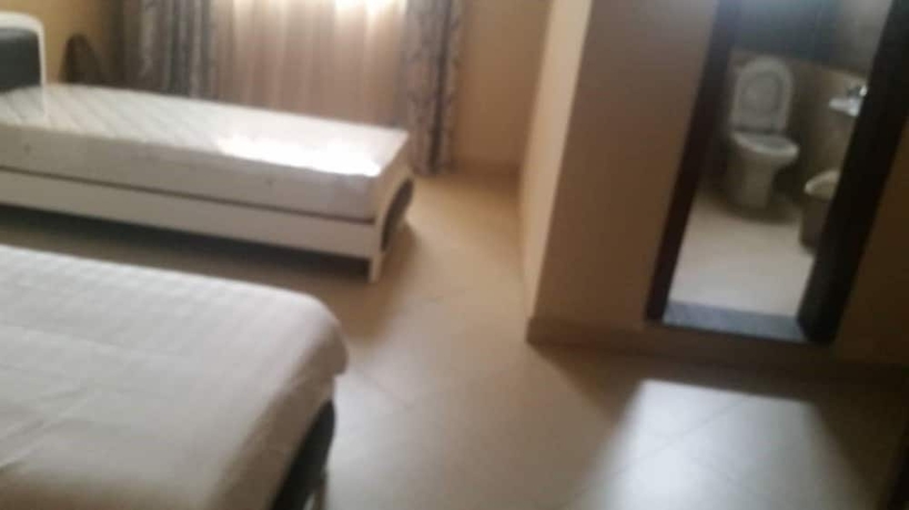 Imagen de la habitación del Hotel Lilu House. Foto 9