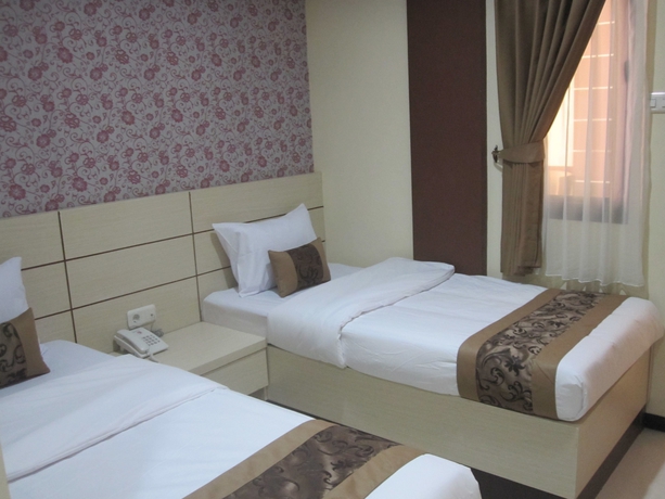 Imagen de la habitación del Hotel Lily Guest House. Foto 2