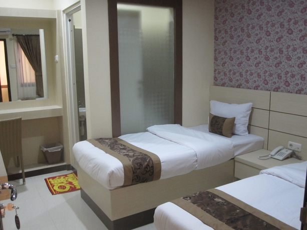 Imagen de la habitación del Hotel Lily Guest House. Foto 3