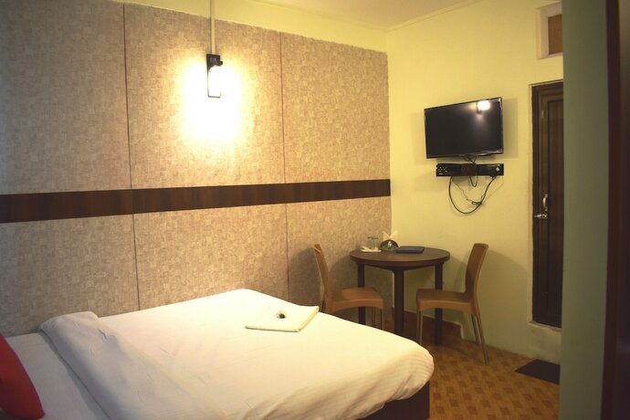 Imagen de la habitación del Hotel Lily Guest House, Shillong. Foto 13