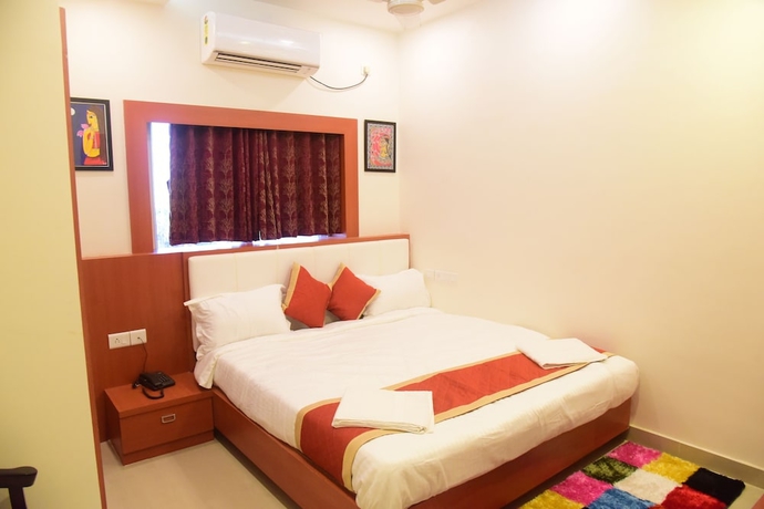 Imagen de la habitación del Hotel Lily Inn, Bhubaneshwar. Foto 8