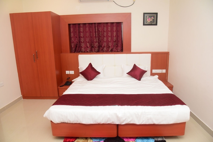 Imagen de la habitación del Hotel Lily Inn, Bhubaneshwar. Foto 10