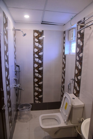 Imagen de la habitación del Hotel Lily Inn, Bhubaneshwar. Foto 11