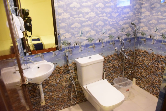 Imagen de la habitación del Hotel Lily Inn, Bhubaneshwar. Foto 12