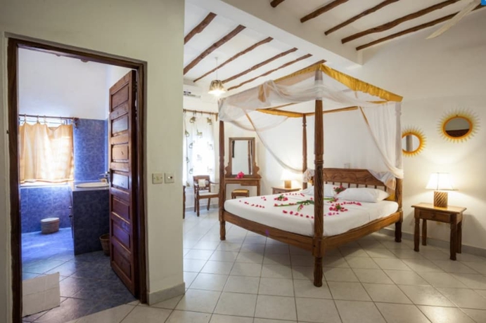 Imagen de la habitación del Hotel Lily Palm Resort. Foto 3