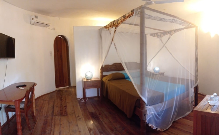 Imagen de la habitación del Hotel Lily Palm Resort. Foto 6