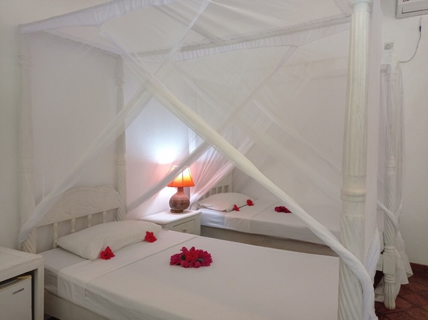 Imagen de la habitación del Hotel Lily Palm Resort. Foto 8