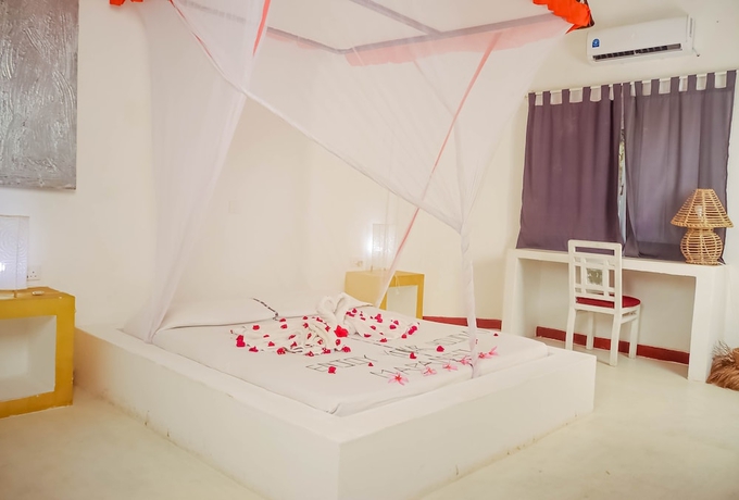 Imagen de la habitación del Hotel Lily Palm Resort. Foto 10