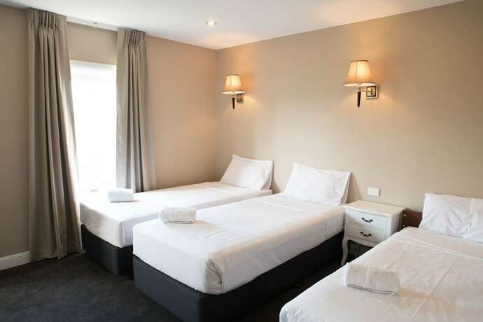 Imagen de la habitación del Hotel Lily Sands Inn. Foto 17