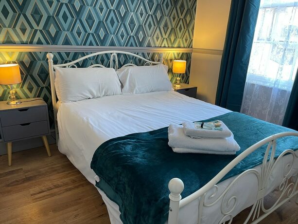 Imagen de la habitación del Hotel LilyRose. Foto 17