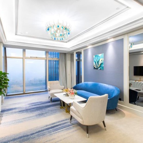 Imagen de la habitación del Hotel Lily's Hangzhou. Foto 4