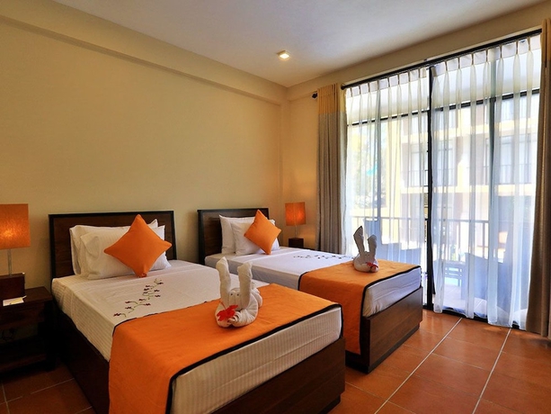 Imagen de la habitación del Hotel Lily\'s Resort. Foto 6