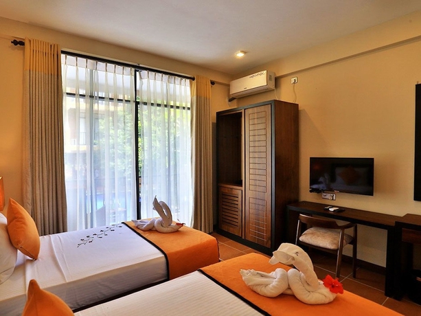 Imagen de la habitación del Hotel Lily\'s Resort. Foto 7