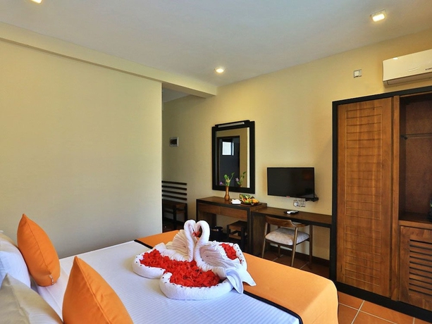 Imagen de la habitación del Hotel Lily\'s Resort. Foto 8
