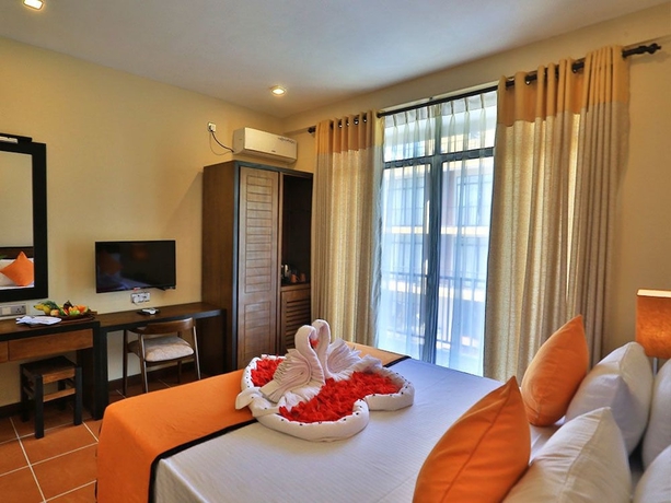 Imagen de la habitación del Hotel Lily\'s Resort. Foto 10