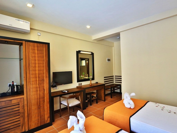 Imagen de la habitación del Hotel Lily\'s Resort. Foto 12