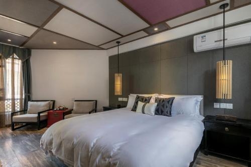 Imagen de la habitación del Hotel Liman Wenzhi No.1 Lijiang Ancient Town. Foto 2