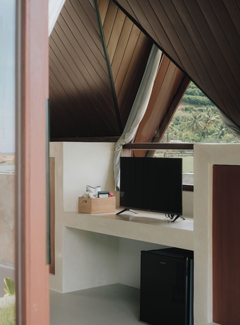 Imagen de la habitación del Hotel Limbo Lux Bungalows. Foto 6