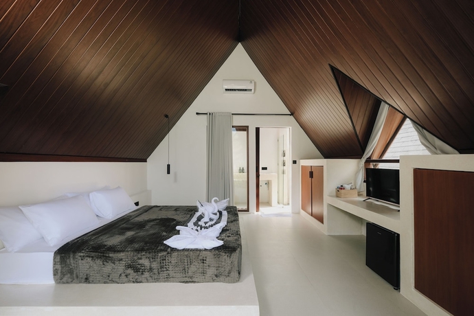 Imagen de la habitación del Hotel Limbo Lux Bungalows. Foto 7
