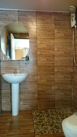 Imagen de la habitación del Hotel Limburi Hometel. Foto 11