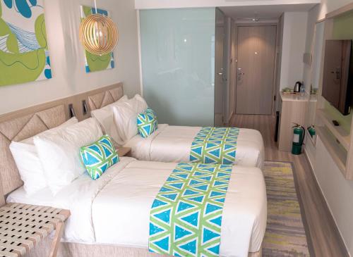 Imagen de la habitación del Hotel Lime Resort Manila. Foto 3