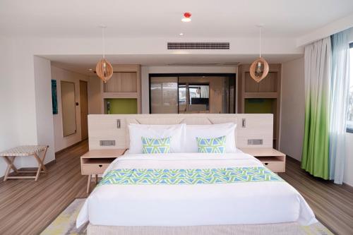 Imagen de la habitación del Hotel Lime Resort Manila. Foto 10