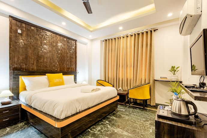 Imagen de la habitación del Hotel Lime Tree and Banquet Huda Metro. Foto 3