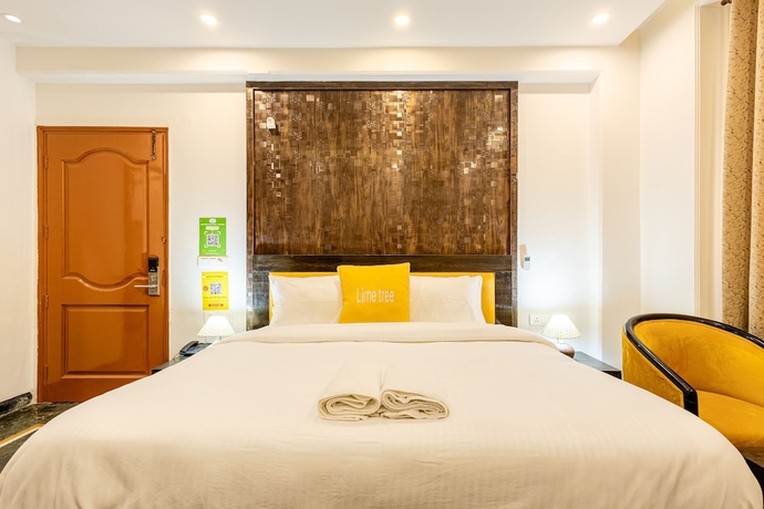 Imagen de la habitación del Hotel Lime Tree and Banquet Huda Metro. Foto 4