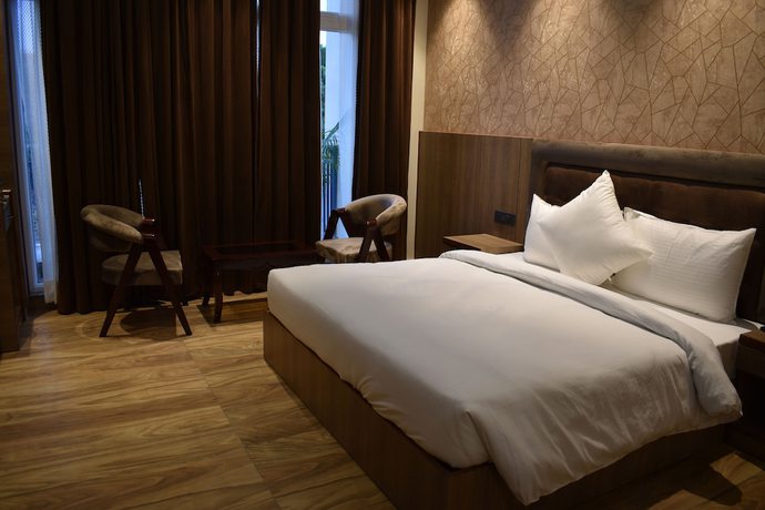 Imagen de la habitación del Hotel Lime Trees And Banquet Greater Noida. Foto 14