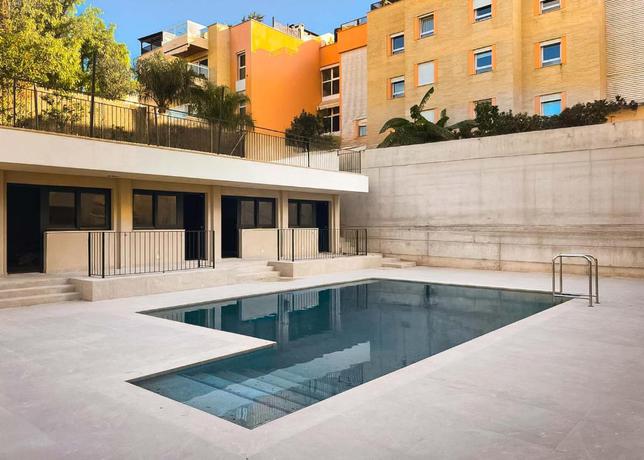 Imagen de la piscina del Hotel Limehome Palma Marina. Foto 7