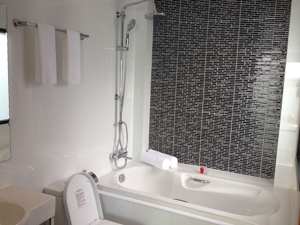 Imagen de la habitación del Hotel Limelight Village. Foto 11