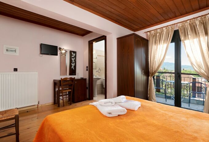 Imagen de la habitación del Hotel Limneo. Foto 18