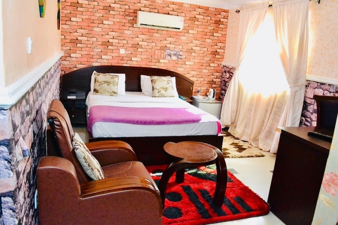 Imagen de la habitación del Hotel Limoh Suites. Foto 11