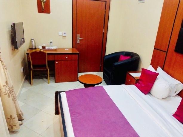 Imagen de la habitación del Hotel Limoh Suites. Foto 12