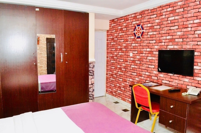 Imagen de la habitación del Hotel Limoh Suites. Foto 13