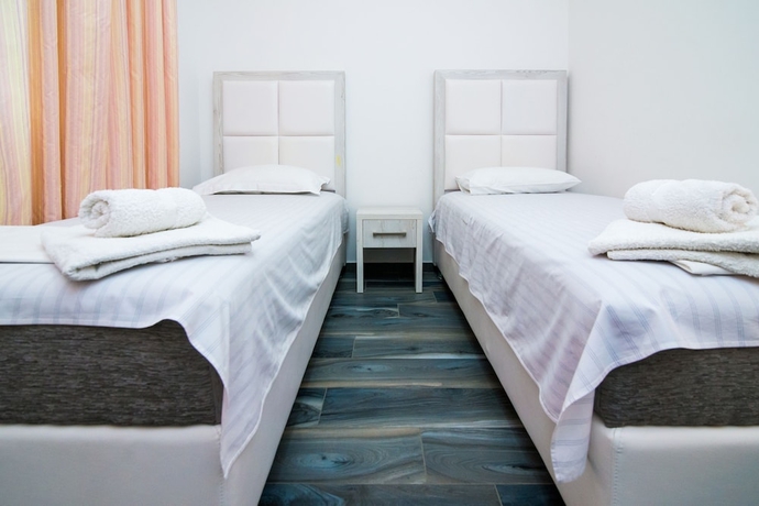 Imagen de la habitación del Hotel Limunada Apartments. Foto 18