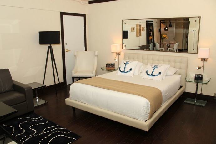 Imagen de la habitación del Hotel Lincoln Arms Suites. Foto 5