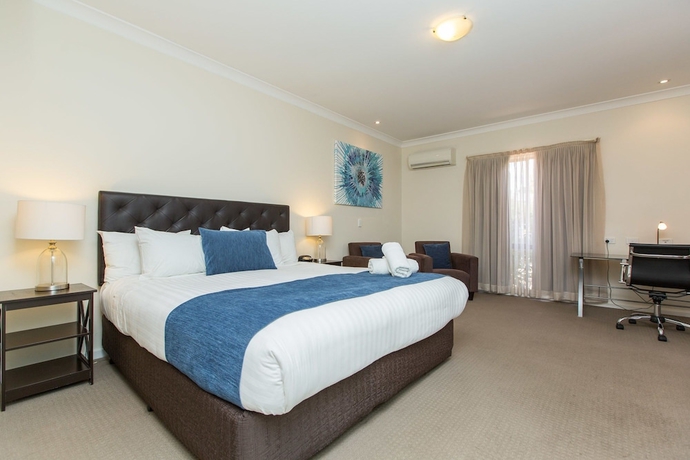 Imagen de la habitación del Hotel Lincoln Cottage Motor Inn. Foto 12