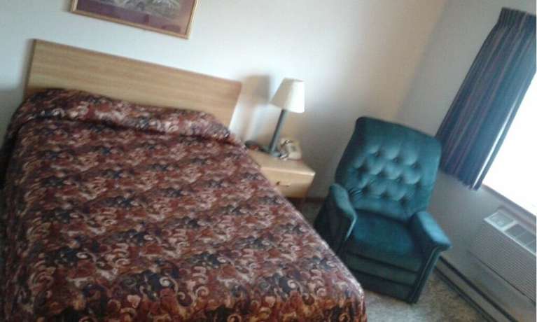 Imagen de la habitación del Hotel Lincoln Host Motor Inn, Escanaba. Foto 16